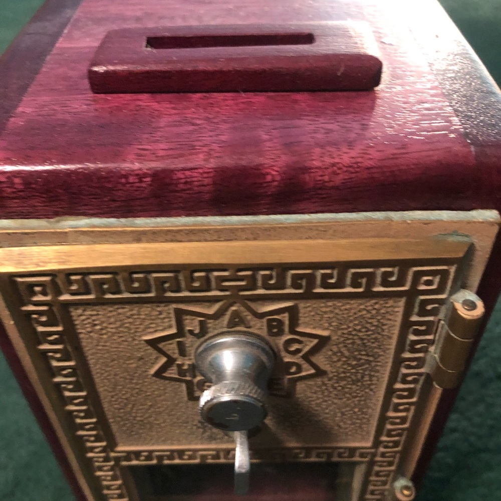 Postal bank handcrafted from Exotic Purple Heart Wood .